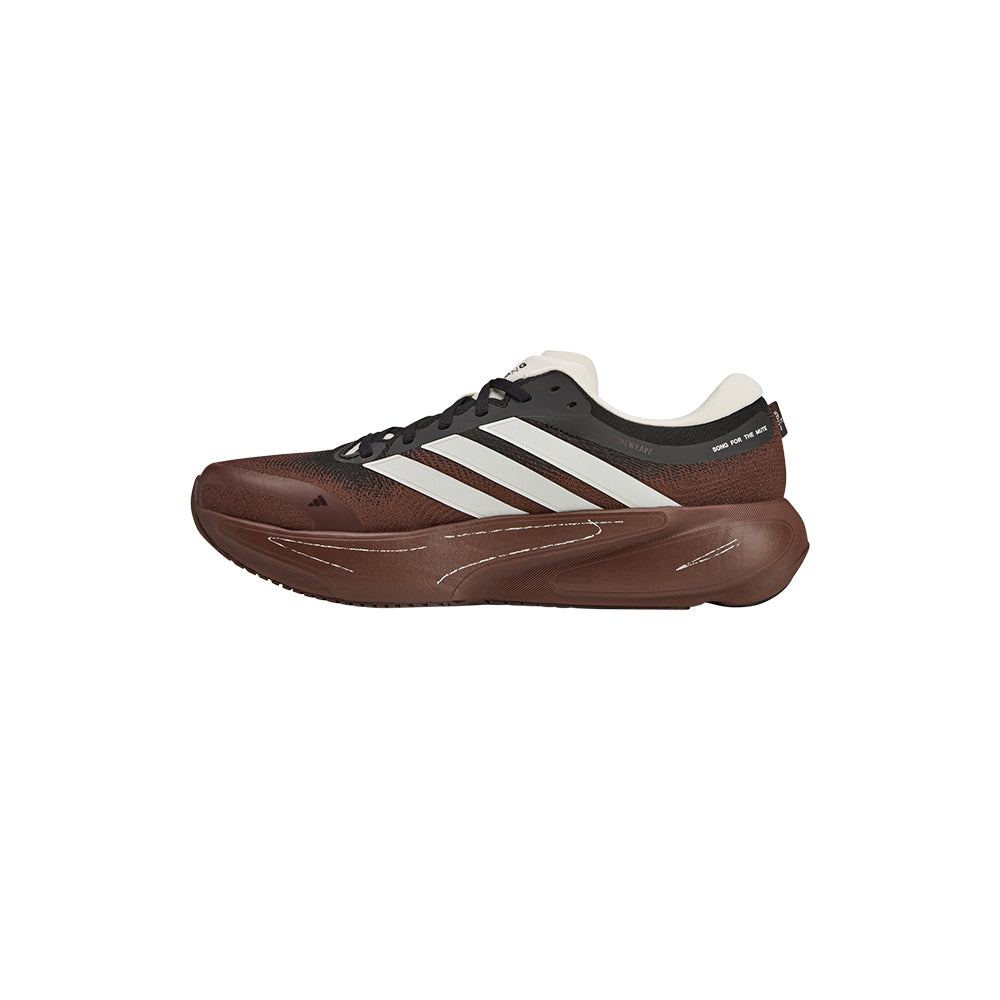 Adidas SFTM Supernova Rise 3 running shoes in auburn, side view showing sleek athletic footwear design.