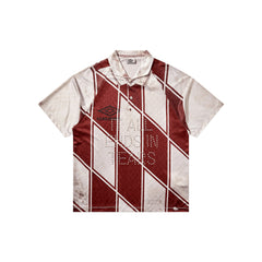 Umbro 90 92 Kit Polo in dirty white with classic polo collar and short sleeves