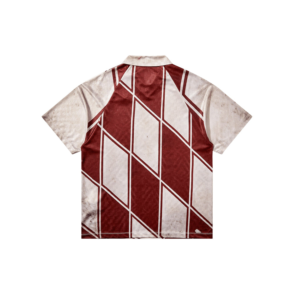 Umbro 90 92 Kit Polo in dirty white, featuring a classic polo collar and short sleeves
