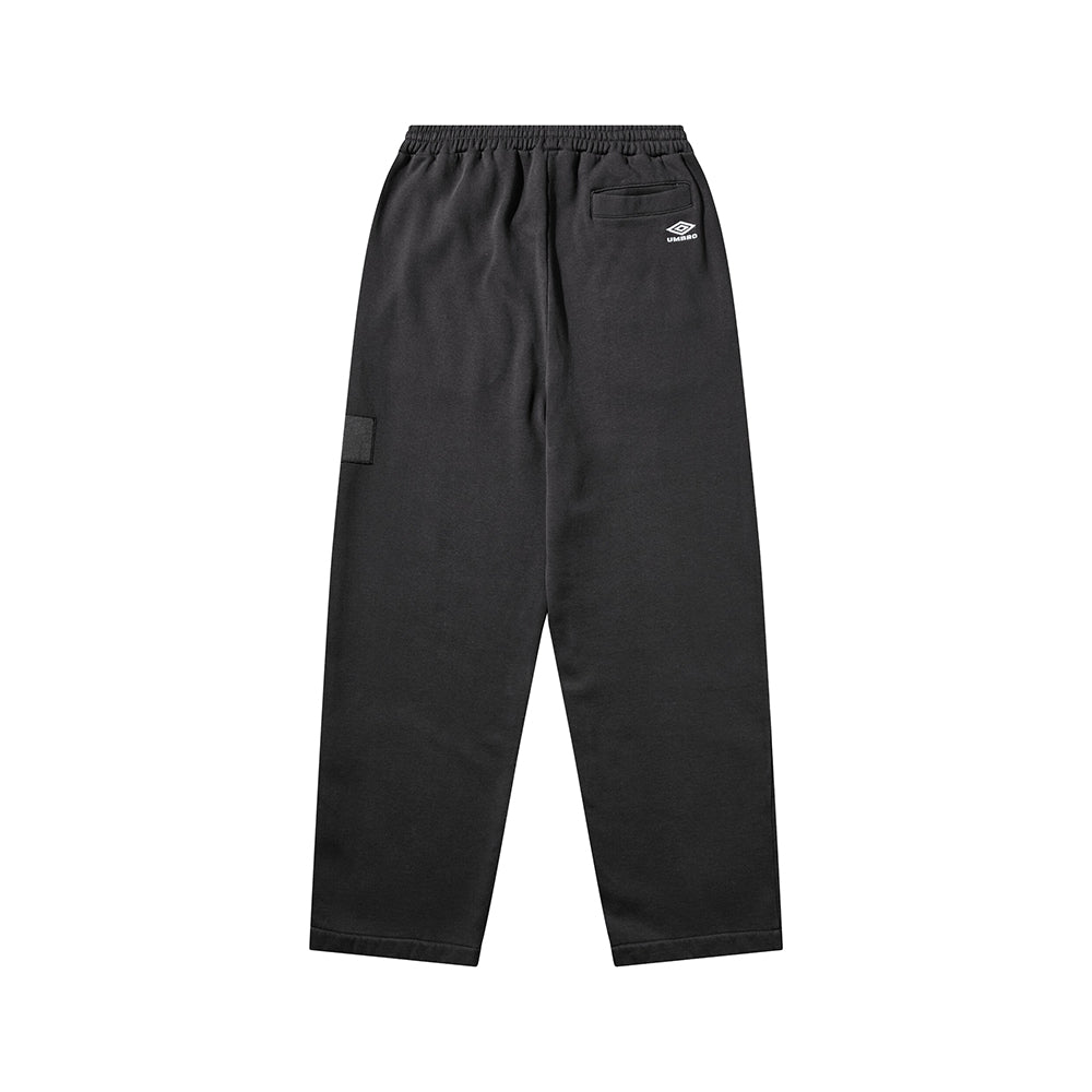 Umbro Censored sweatpants in washed black with relaxed fit and elastic cuffs