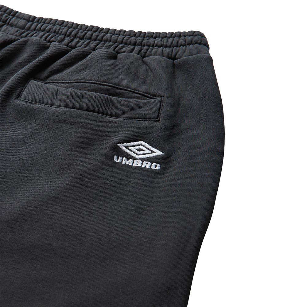 Umbro Censored sweatpants in washed black with relaxed fit and elastic waistband