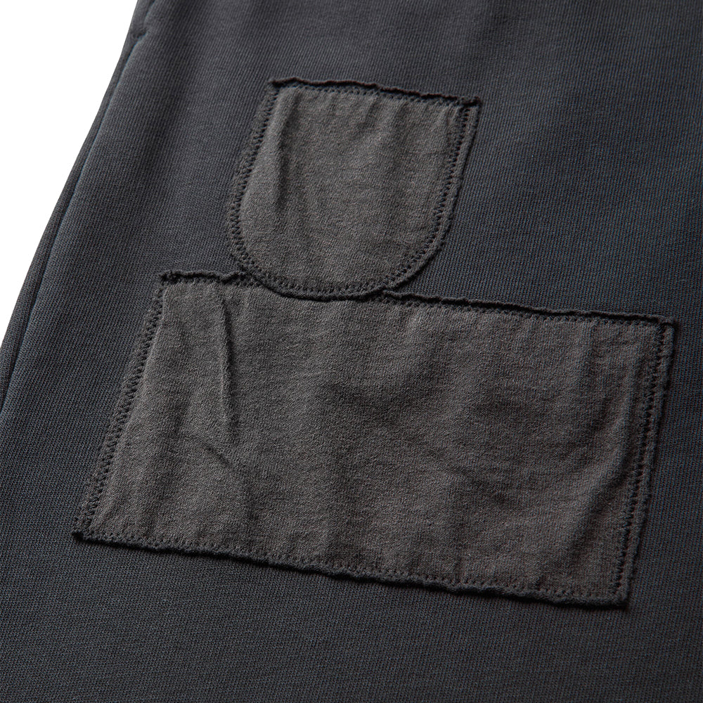 Umbro Censored sweatpants in washed black with relaxed fit and elastic waistband