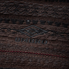 Umbro Fair Isle Crest crewneck sweater in black and brown with multicolor patterned knit design