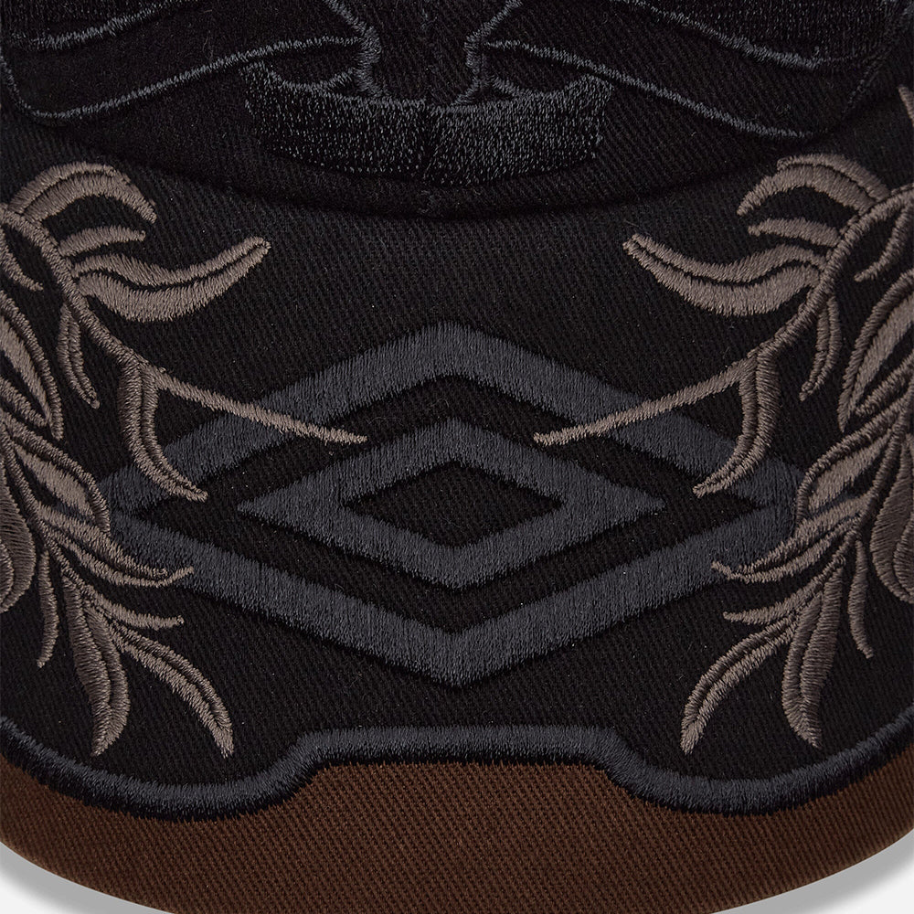 Umbro Laurel Cap in brown, classic headwear design with adjustable back strap
