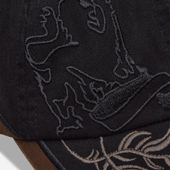 Umbro Laurel Cap in brown, featuring a curved brim and embroidered logo on the front