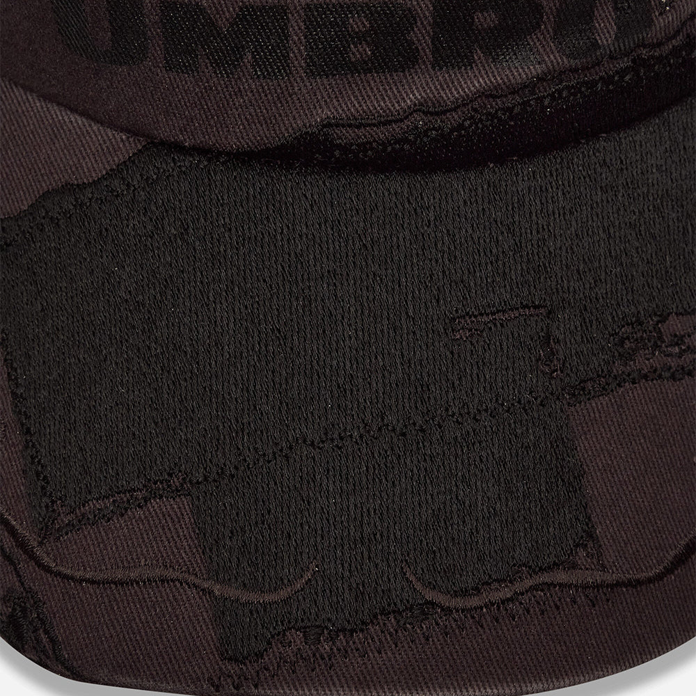 Umbro Censored Cap in dark grey, embroidered logo and curved brim
