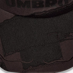 Umbro Censored Cap in dark grey, embroidered logo and curved brim