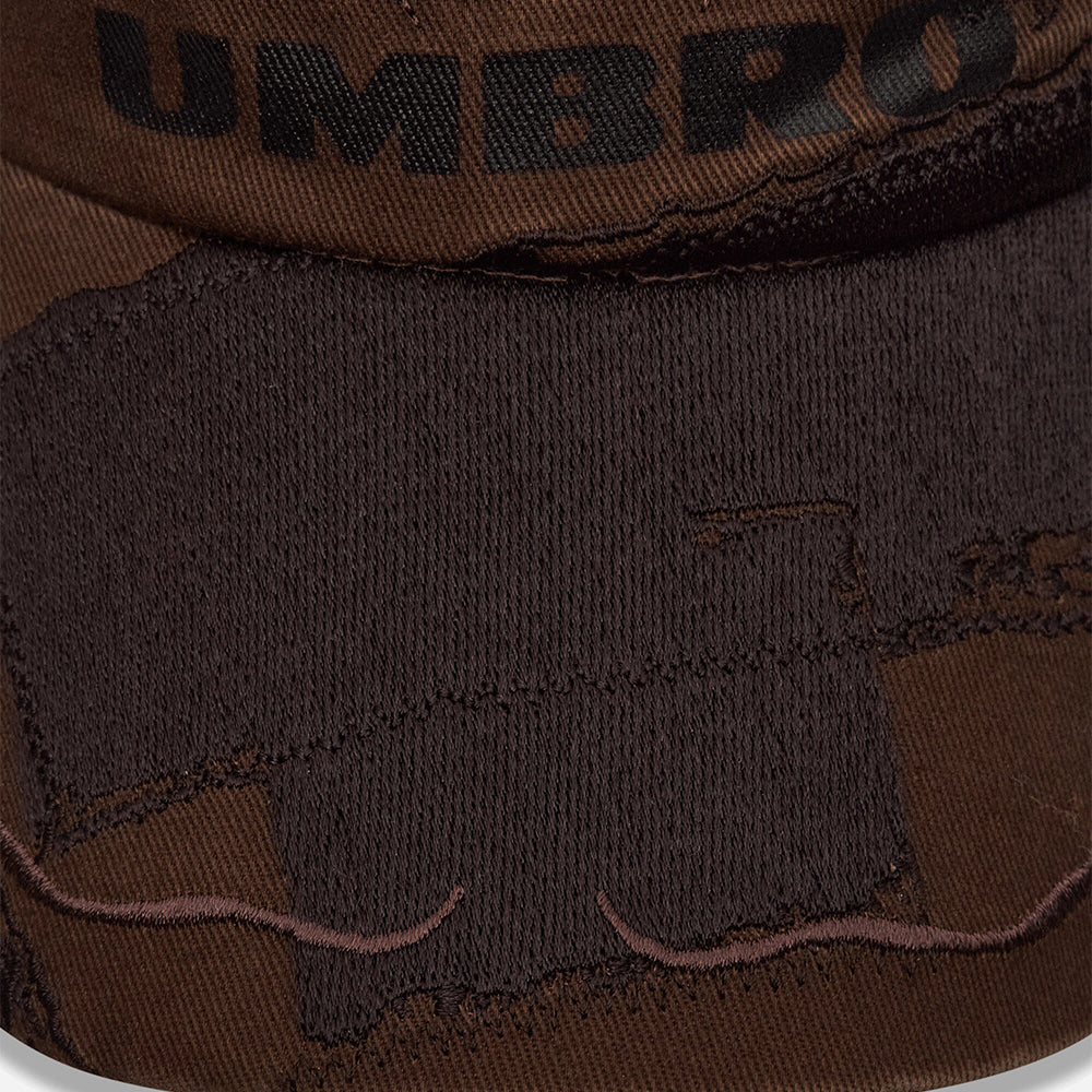 Umbro Censored Cap in brown olive, structured headwear with embroidered logo and adjustable back strap