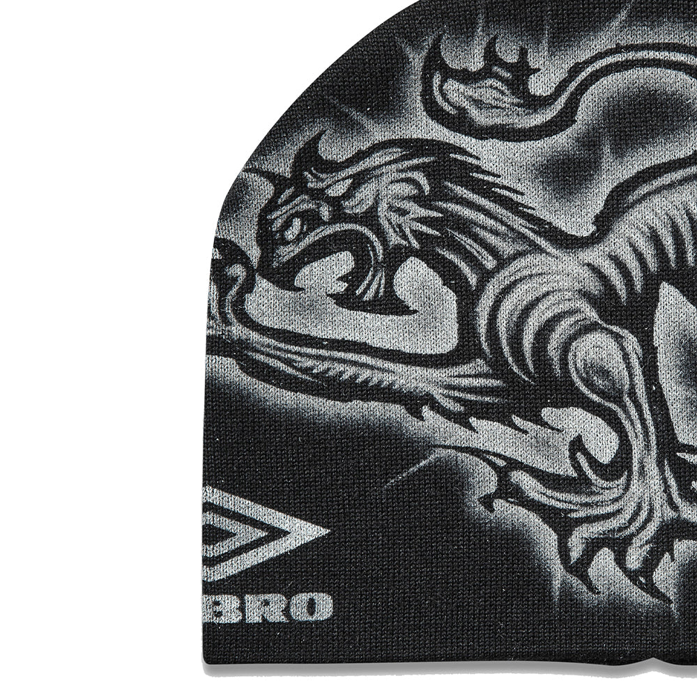 Umbro Heraldic Beanie in black, classic knit headwear with embroidered logo detail