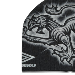 Umbro Heraldic Beanie in black, classic knit headwear with embroidered logo detail