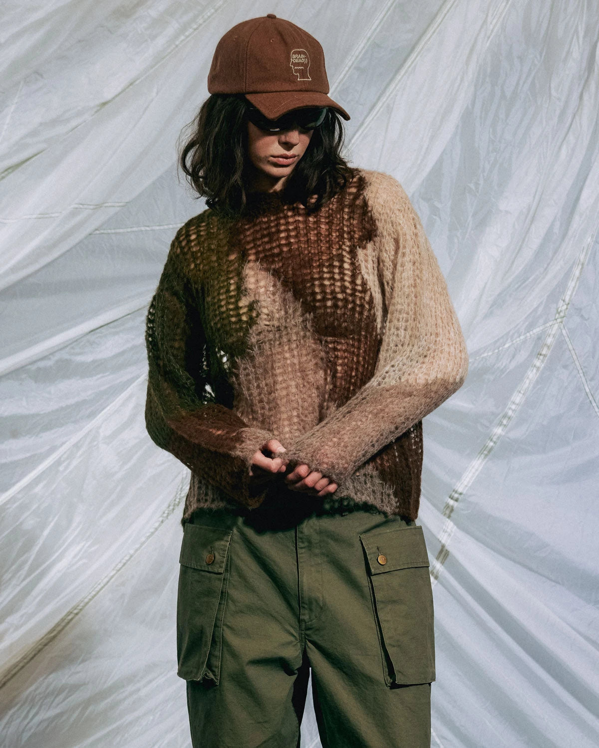 Organic Threadbare Olive Sweater by Brain Dead, showcasing a cozy, textured sweater with a relaxed fit and subtle branding.