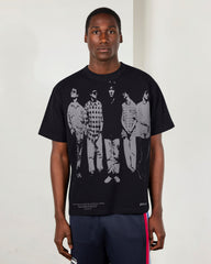 Faded black heavyweight T-shirt by Pleasures featuring a casual fit and minimalist design, shown on a neutral background.