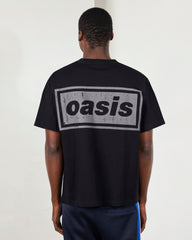 Faded black heavyweight Pleasures T-shirt with graphic design and relaxed fit, displayed flat on a white background.