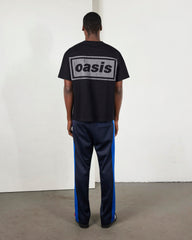 Faded black heavyweight Pleasures T-shirt with graphic design, showcasing a casual and stylish fit.