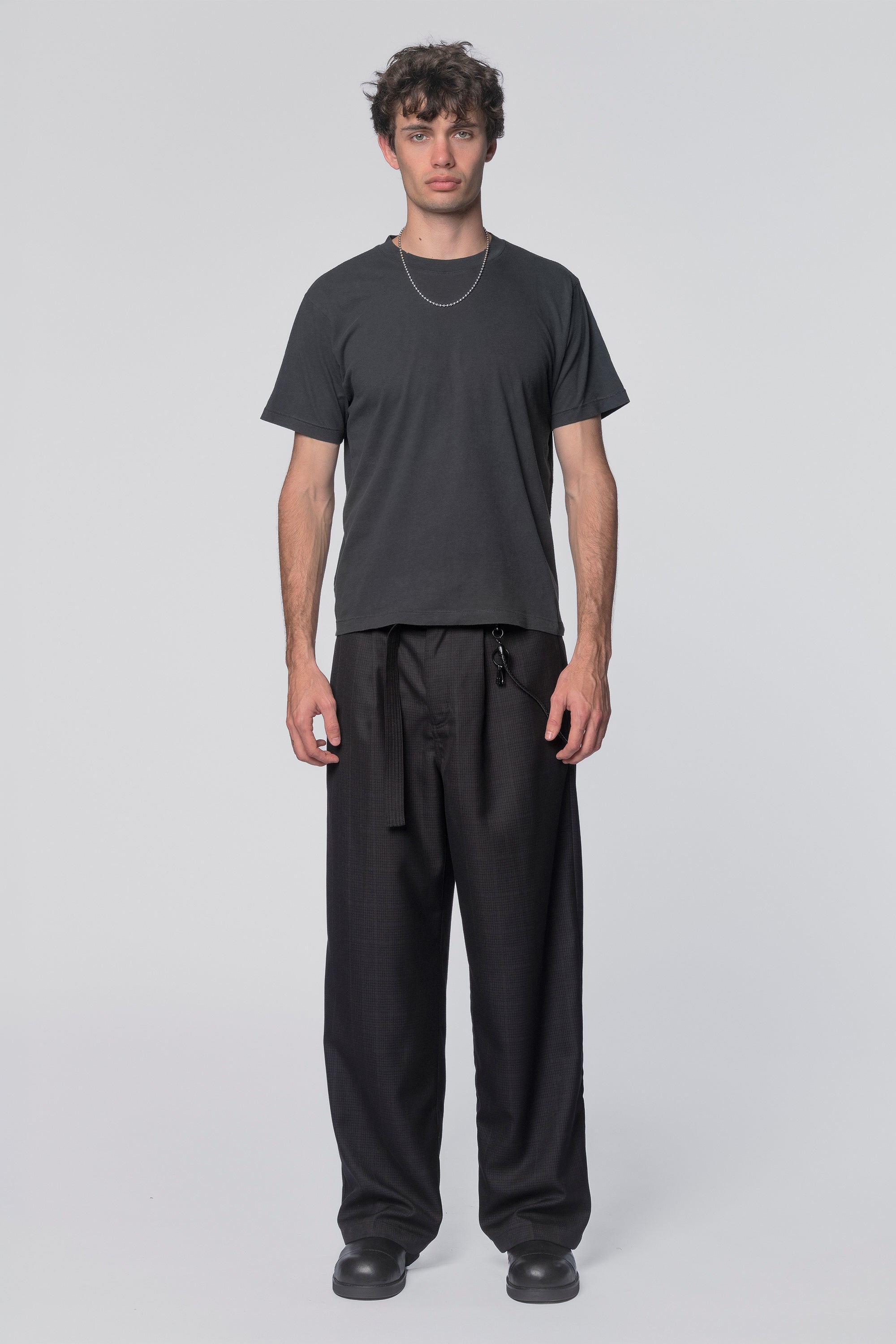 Black Tide T-Shirt by Beach Brains featuring a casual fit and ocean-inspired design, perfect for everyday wear.