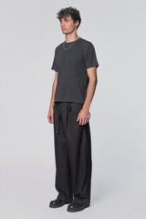 Black Tide T-Shirt by Beach Brains featuring a casual fit and ocean-inspired design, displayed on a neutral background.