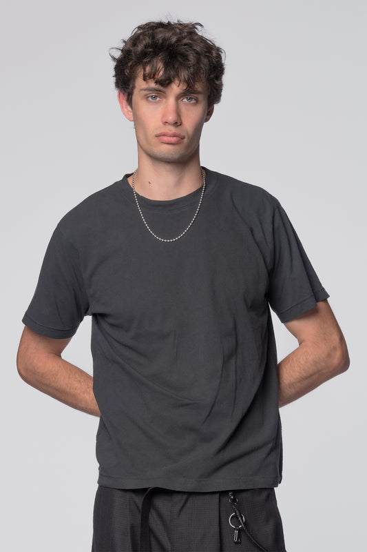 Black Tide T-Shirt by Beach Brains featuring a casual fit and graphic design, shown on a plain background.