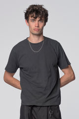 Black Tide T-Shirt by Beach Brains featuring a casual fit and graphic design, shown on a plain background.